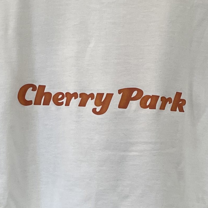 Cherry Park band's clothing merchandise style option: Cherry Park Text (Orange)